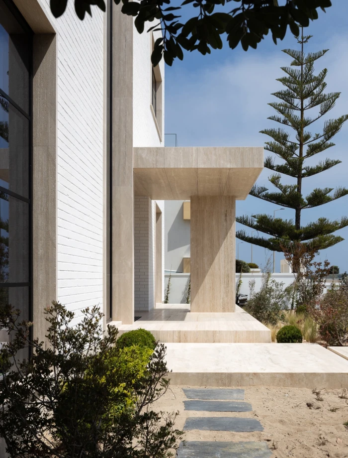 Architecture for a Holiday House on a coastline Left Image 3